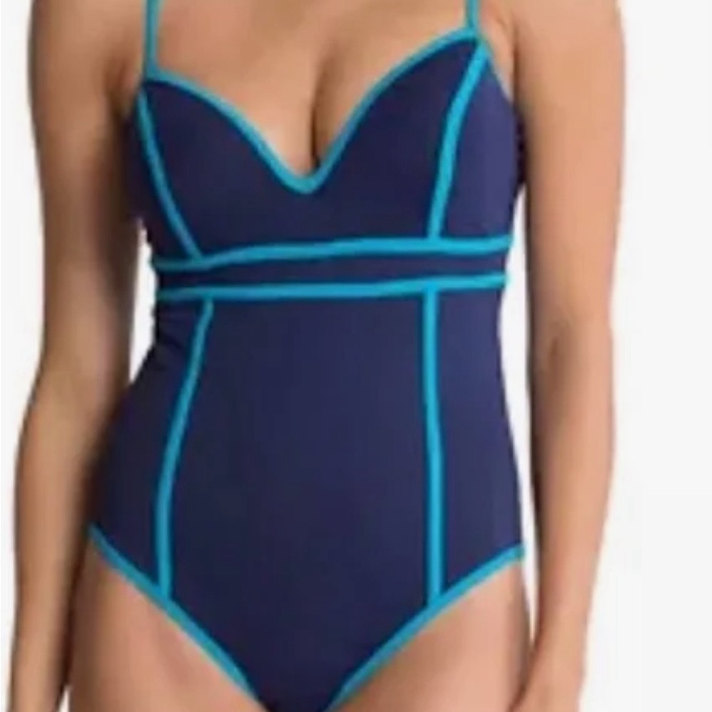 Brand new with tags and hygienic liner.  Figure flattering Spanx bathing suit.